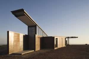 Montecito Residence exterior featuring weathered exposed structural steel