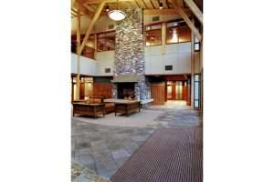 Philip Starr Building interior lobby featuring stone fireplace