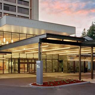 Providence St. Peter Hospital exterior entrance closeup at night, Olympia, WA