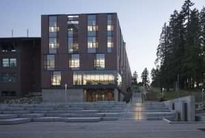 University of Washington Bothell Discovery Hall exterior front bottom of stairs at night