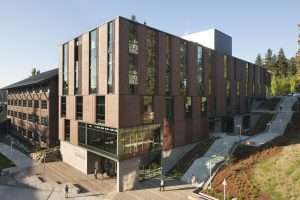 University of Washington Bothell Discovery Hall exterior side elevation showing slope