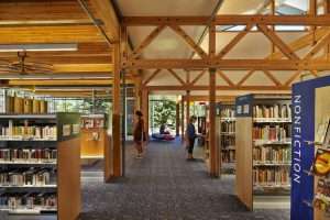 Vashon Island Library interior featuring exposed timber ceiling
