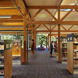 Vashon Island Library interior featuring exposed timber ceiling