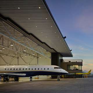 Airplane with nose out of the Northwest Airplane Hangar