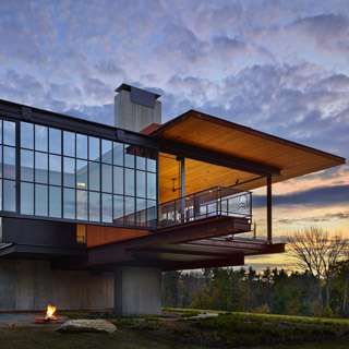 Berkshire Residence in Massachusetts featuring cantilevered roof and walk