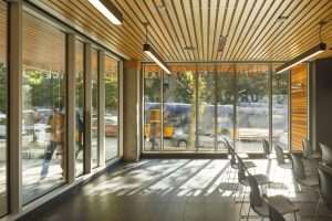 University of Washington Police Station interior seating area featuring window walls and wood ceiling