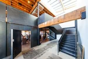 Charles Smith Wines Jet City interior featuring exposed timber