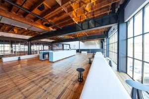 Charles Smith Wines Jet City interior retail space featuring exposed timber