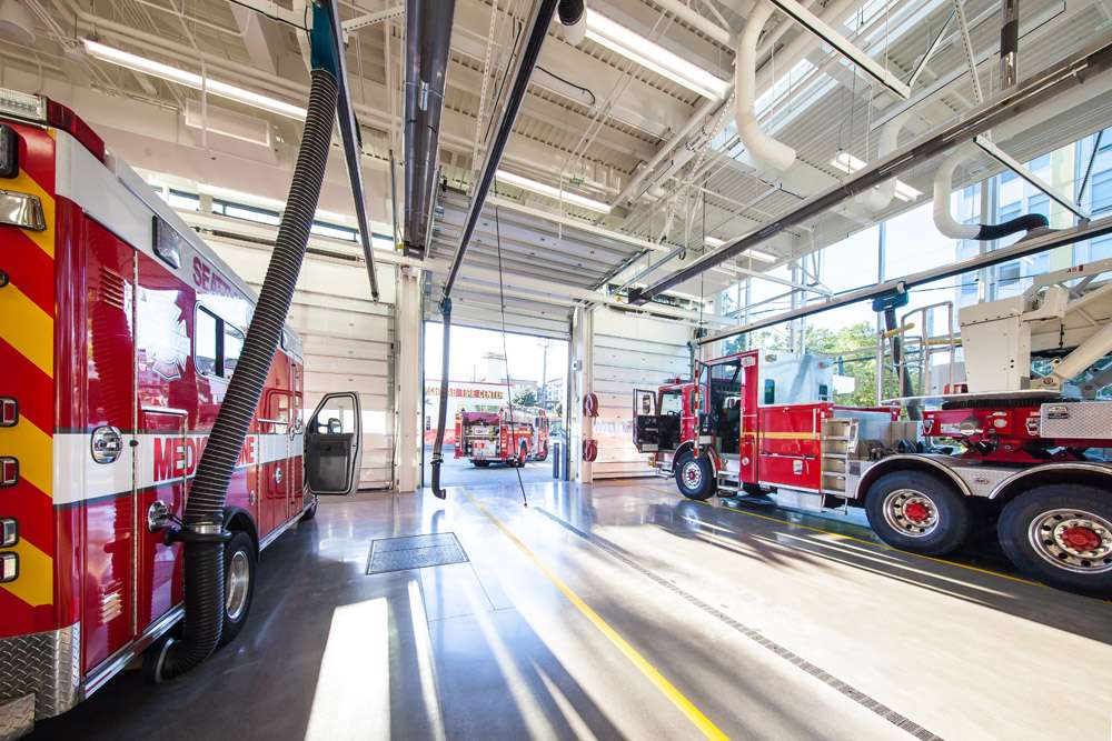Seattle Fire Station 32 Seattle Fire Station 32 interior bay between two trucks.