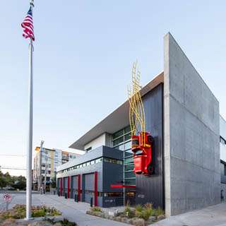 Seattle Fire Station 32 view  art feature fire truck on side of wall