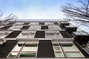 Three20 Apartments exterior detail looking straight up front of building