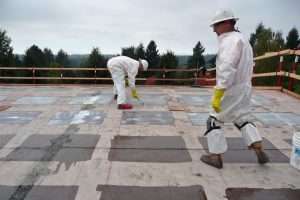 Working with Fiber Reinforced Plastic on the roof at Cedar Park Elementary School