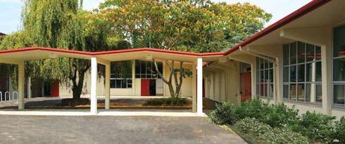 Cedar Park Elementary School exterior walks featuring historic roof lines designed by Paul Thiry