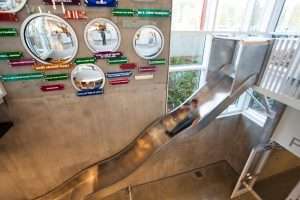 Eastside Community Center in Tacoma, interior view of child on slide.