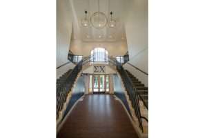 Grand foyer and twin stair cases at Sigma Chi Centennial Chapter House