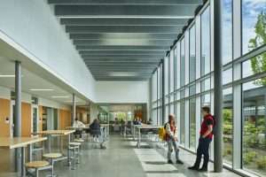Bainbridge Island High School interior seating area with courtyard view