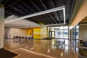 Grant Center for the Expressive Arts interior work area with open ceiling featuring dropped light, Tacoma, WA