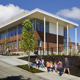 Magnolia Elementary School students walking up hill, Seattle, WA