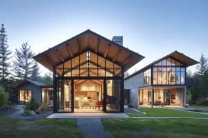 Tumble Creek Residence exterior front showing high open ceiling