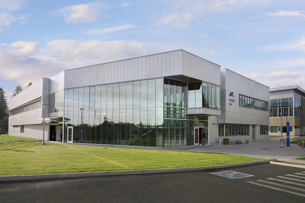 Pierce-College-Glacier-Building-Exterior A silver-colored, angular building with tall windows.